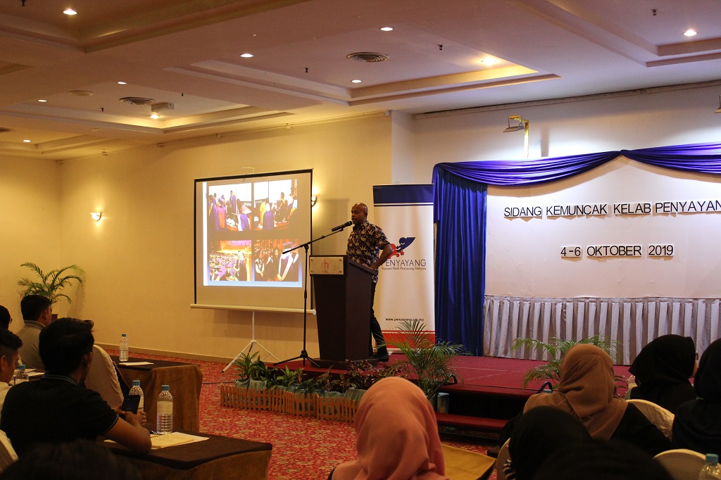 Presenter on stage